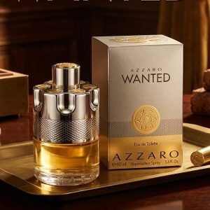 Azzaro Wanted Perfume Bottle Featuring Golden Liquid With a Textured Silver Metal Cap