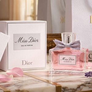 Dior Miss Dior Eau De Perfum In Soft Pink With a Silver Bow Accent