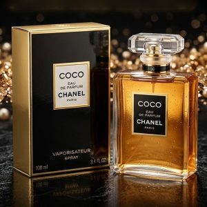 Chanel Coco Eau de Perfume With Amber-Colored Fragrance In a Clear Bottle With Black And Gold Accents