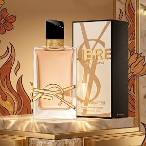 Yves Saint Laurent Nude Beige Glass Perfume Bottle With Gold Accents And a Black Cap