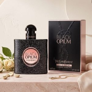 Yves Saint Laurent Black Opium Eau de Perfume In a Black Glitter-Finish Bottle With Rose-Gold Accents