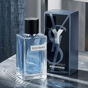 Yves Saint Laurent Rectangular Glass Perfume Bottle With Light Blue Fragrance And Black Cap